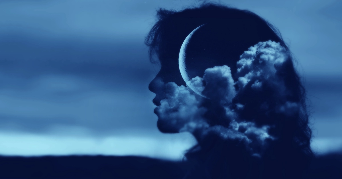 An artistic image showing a silhouette of a person's profile blended with a night sky, featuring a crescent moon and clouds.