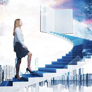 A businesswoman climbing a spiral staircase leading to an open book in the sky, with a futuristic cityscape in the background.