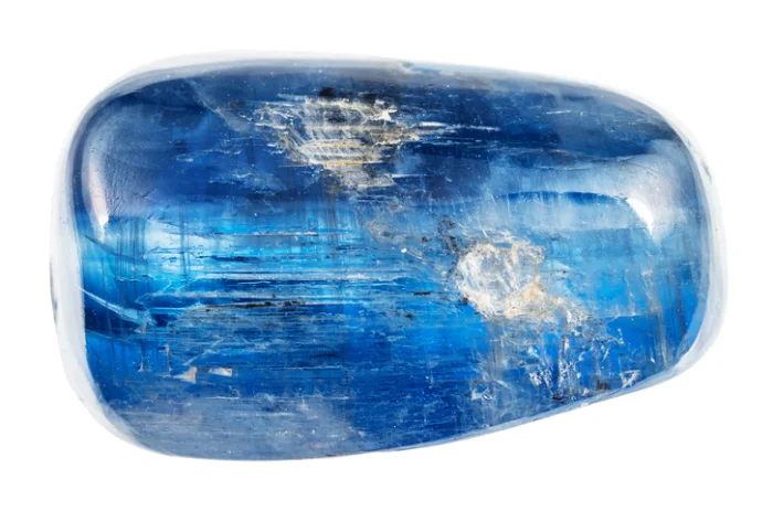 Polished blue kyanite gemstone with a glossy surface.