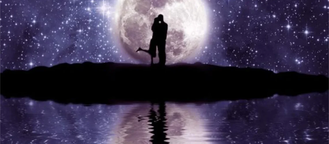 A romantic silhouette of a couple embracing under a glowing full moon, with a star-filled sky and its reflection shimmering on calm water.